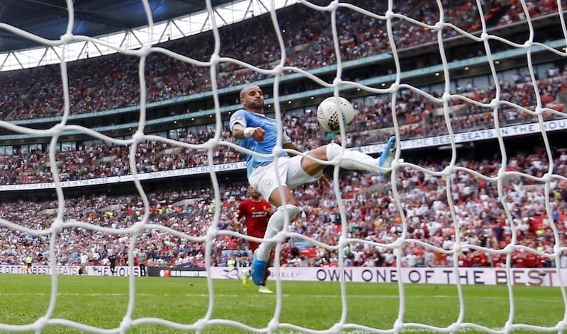 Manchester City's Kyle Walker spectacularly clears the ball from the goal line after Mohamed Salah's header. Action Images via Reuters