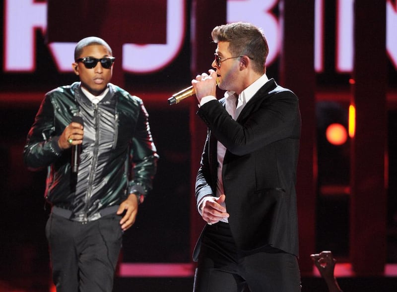 Pharrell Williams, left, and Robin Thicke perform onstage at the BET Awards at the Nokia Theatre in Los Angeles. Frank Micelotta / Invision / AP file