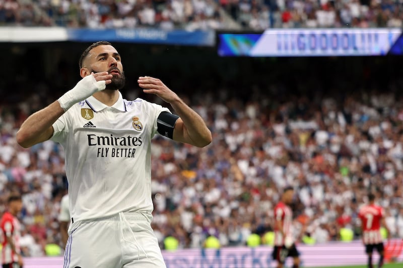 Real Madrid's French forward Karim Benzema celebrates scoring a goal from the penalty spot against Athletic Club. AFP