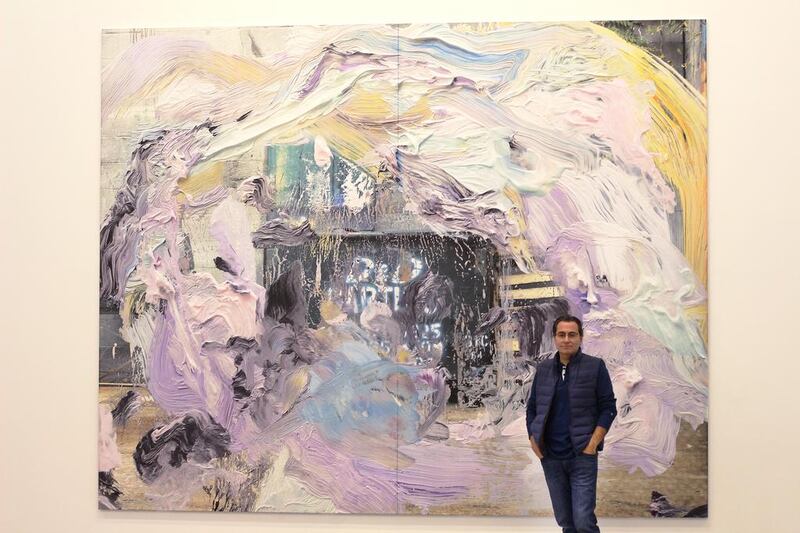 Retail magnate Tony Salame poses in front of one of the artworks from his collection on display at his newly opened Aishti Foundation, which is housed in a futuristic building on the coast just outside of Beirut. Josh Wood for The National
