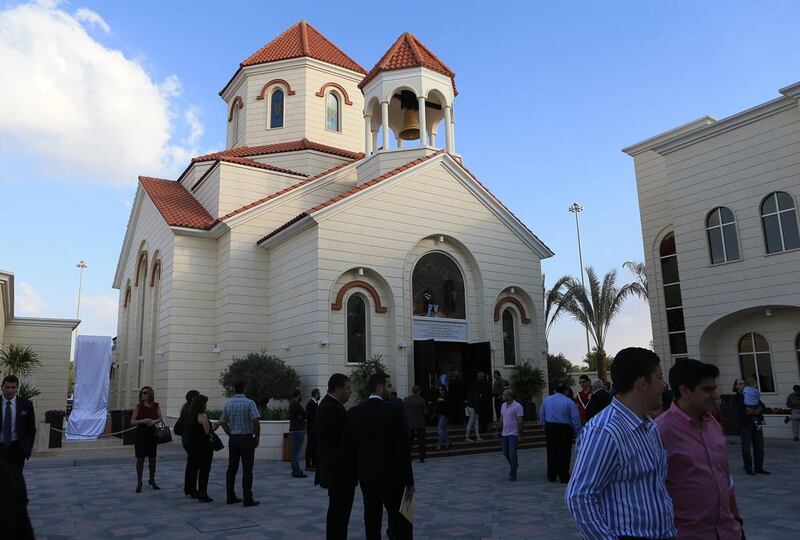 Armenians gather to witness the recent consecration of the Holy Martyrs’ Armenian Church at Mussaffah in Abu Dhabi. Ravindranath K / The National