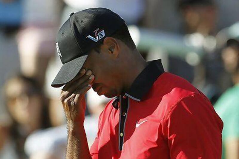 Tiger Woods missing a birdie putt that would have put him in a tie for the lead in the final round of the Barclays tournament. Gary Hershorn / Reuters