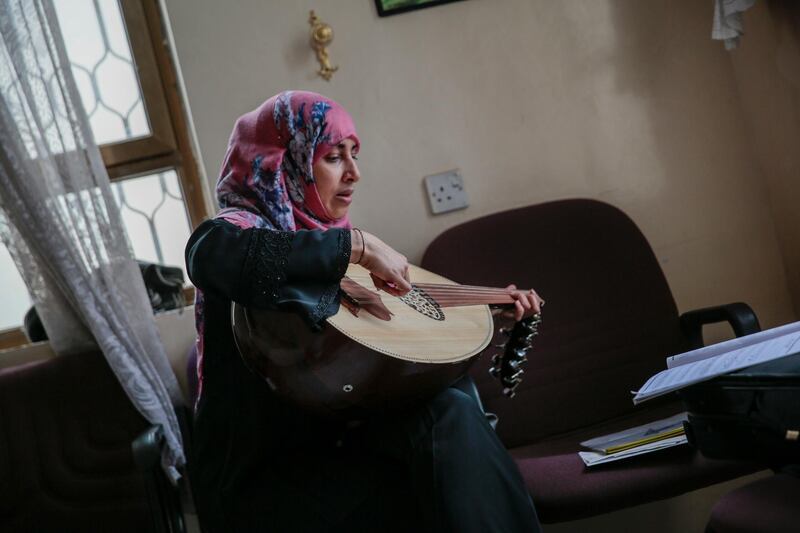 A female Yemeni music student practices playing Oud during a music class at the Cultural Centre in Sanaa, Yemen. Hani Mohammed / AP Photo