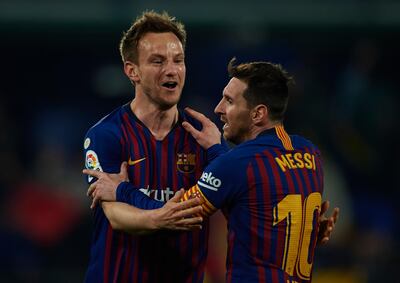 VILLAREAL, SPAIN - APRIL 02: Lionel Messi of Barcelona and Ivan Rakitic of Barcelona celebrate after the fourth goal of his team scored by Luis Suarez (not in frame)  during the La Liga match between Villarreal CF and FC Barcelona at Estadio de la Ceramica on April 02, 2019 in Villareal, Spain. (Photo by Manuel Queimadelos Alonso/Getty Images)