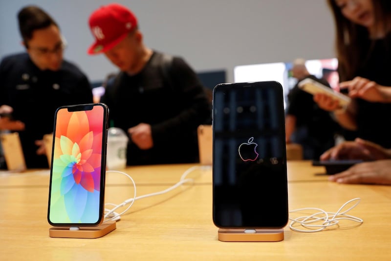 FILE PHOTO: The new Apple iPhone Xs Max and iPhone X are seen on display at the Apple Store in Manhattan, New York, U.S., September 21, 2018.  REUTERS/Shannon Stapleton/File Photo