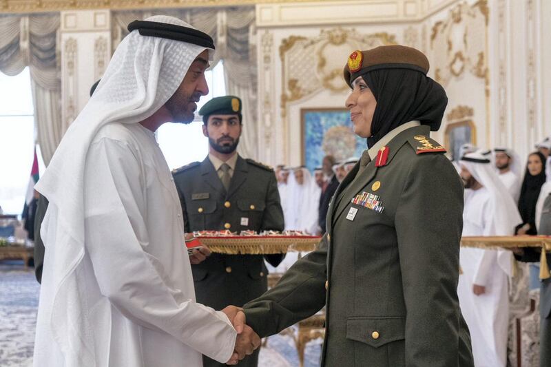 Sheikh Mohamed bin Zayed, Crown Prince of Abu Dhabi and Deputy Supreme Commander of the UAE Armed Forces, bestows the Second Class Medal of Honour to Col Dr Aisha Al Dhaheri during a ceremony at Qasr Al Bahr Majlis in Abu Dhabi on Monday. Courtesy Sheikh Mohamed bin Zayed Twitter
