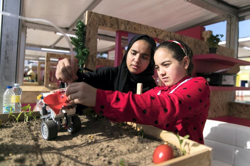 ABU DHABI, UNITED ARAB EMIRATES - JANUARY 31, 2019.

Huwaida Salah, 14, and Alia Ali, 12, from Al Shumookh School, have developed a Seed Sowing Robot with their schoolmates.

They are exhibiting their project at Abu Dhabi Science Festival at the corniche in Abu Dhabi.

The event focuses on STEAM subjects (science, technology, engineering, arts and mathematics). Around 200 innovators are displaying their projects at the three host venues over 10 days.

(Photo by Reem Mohammed/The National)

Reporter: GILLIAN DUNCAN
Section:  NA