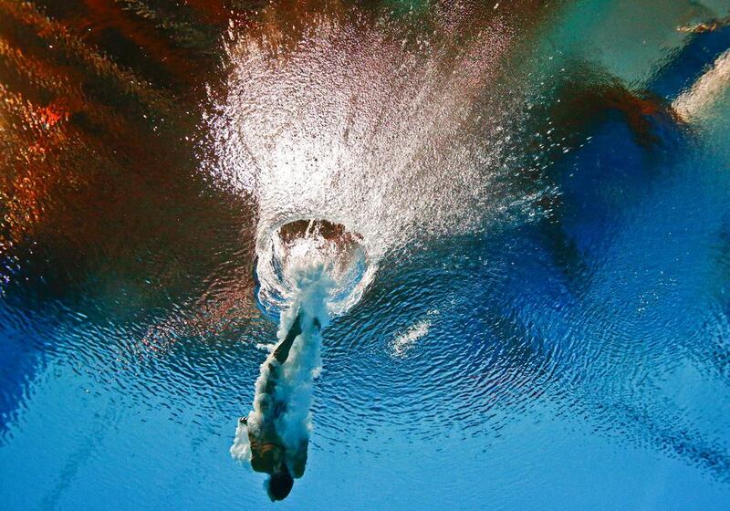 Tania Cagnotto of Italy is seen underwater during the women’s 3m springboard semi final at the Aquatics World Championships in Kazan, Russia July 31, 2015. REUTERS/Stefan Wermuth