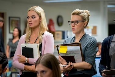 Margot Robbie, left, and Kate McKinnon in a scene from 'Bombshell'. AP