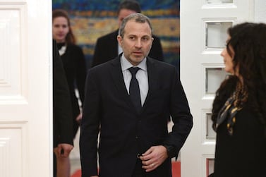 Lebanese Foreign Minister Gebran Bassil (C) arrives for talk with Hungarian Trade and Foreign Minister Peter Szijjarto (not pictured) at the Trade Minstry in Budapest on November 26, 2019. / AFP / Attila KISBENEDEK