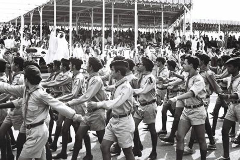 Sheikh Zayed at the 1st anniversary of National Day celebration in 2nd December 1972, waving as the scout parade takes place. Courtesy Al Ittihad
