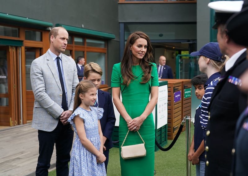 The royals speak to ball boys and girls at Wimbledon before the final. AFP