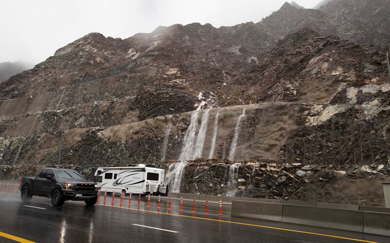 Bouts of heavy rain made for slippery road conditions for motorists in Sharjah. Ruel Pableo for The National
