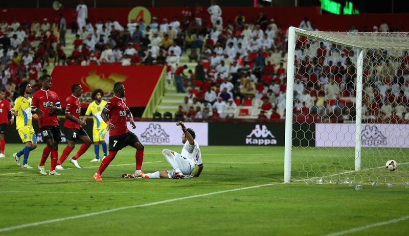 Hugo Viana (not seen) of Al Ahli scores their third goal from a free kick against Al Dhafra on Sunday. Warren Little / Getty Images