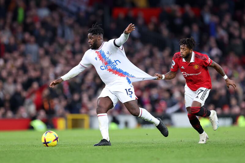 Jeffrey Schlupp of Crystal Palace is challenged by Fred. Getty