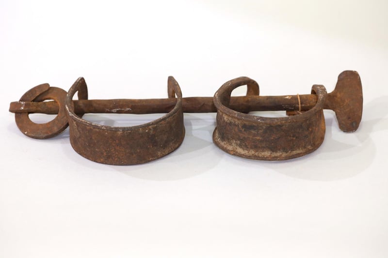 Slave shackles dated from the period of slavery are displayed as part of the collection at the Museum of Civilizations of Ivory Coast in Abidjan, Ivory Coast, June 20, 2019. The shackles were used to restrain the feet of the slaves to keep them immobile during their transport in boats or when held in cells. They were acquired by the museum in 1942. August 2019 marks 400 years since the slave trade to North America began.  Picture taken June 20, 2019.    REUTERS/Luc Gnago  NO RESALES. NO ARCHIVES