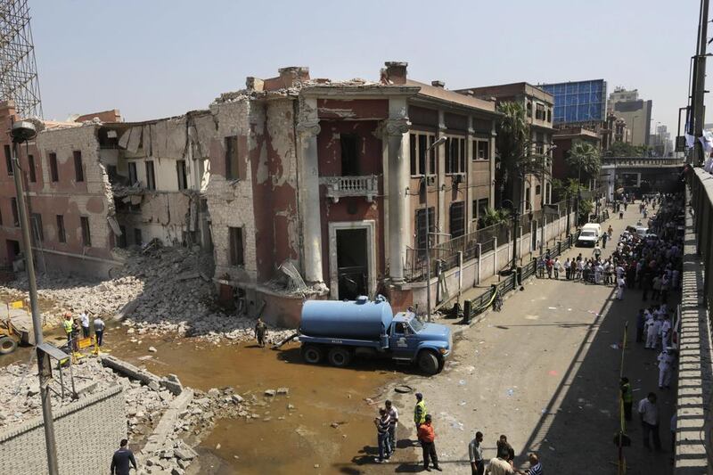 The Italian consulate in Cairo after a car bomb killed one and injuried several civilians. Amr Nabil / AP Photo