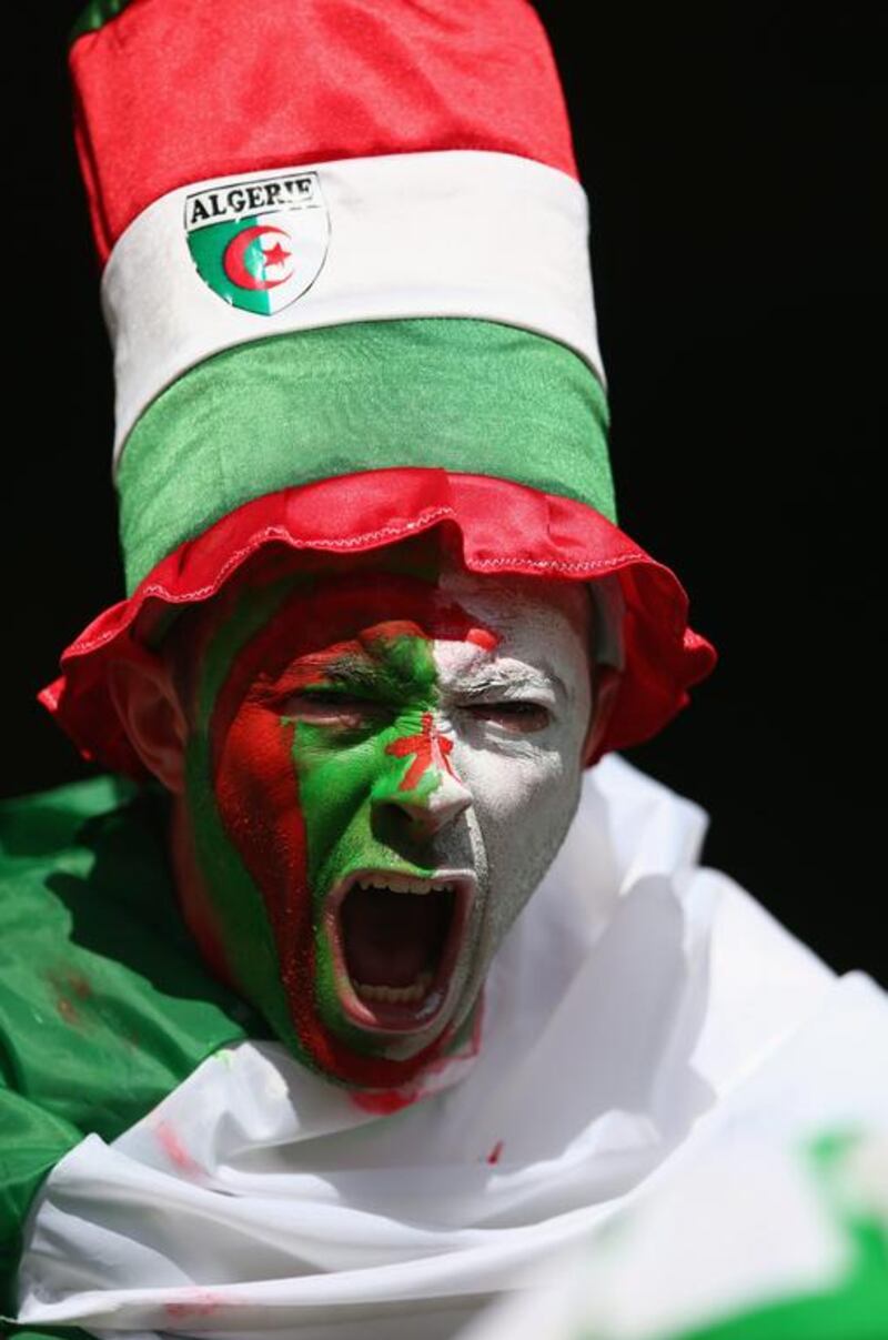 An Algeria fan in Belo Horizonte, Brazil. Paul Gilham / Getty Images