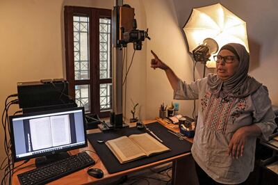 Shaimaa Al Budeiri is the head of the digital library. AFP
