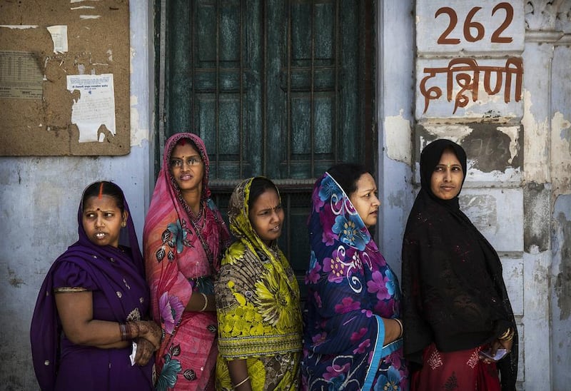 Women queue to vote in Varanasi on May 12, 2014, in the ninth and final phase of India's general elections. Kevin Frayer / Getty Images