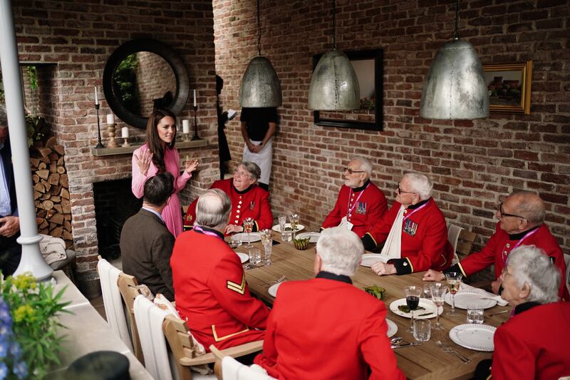 The princess speaks to Chelsea Pensioners. PA