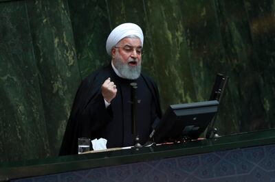 Iranian President Hassan Rouhani speaks as he submits next year's budget bill to parliament in Tehran, Iran, Tuesday, Dec. 25, 2018. The $47.5 billion budget is less than half of last year's, mainly due to the severe depreciation of the local currency following President Donald Trump's decision to withdraw from the 2015 nuclear deal and restore U.S. sanctions. (AP Photo/Vahid Salemi)