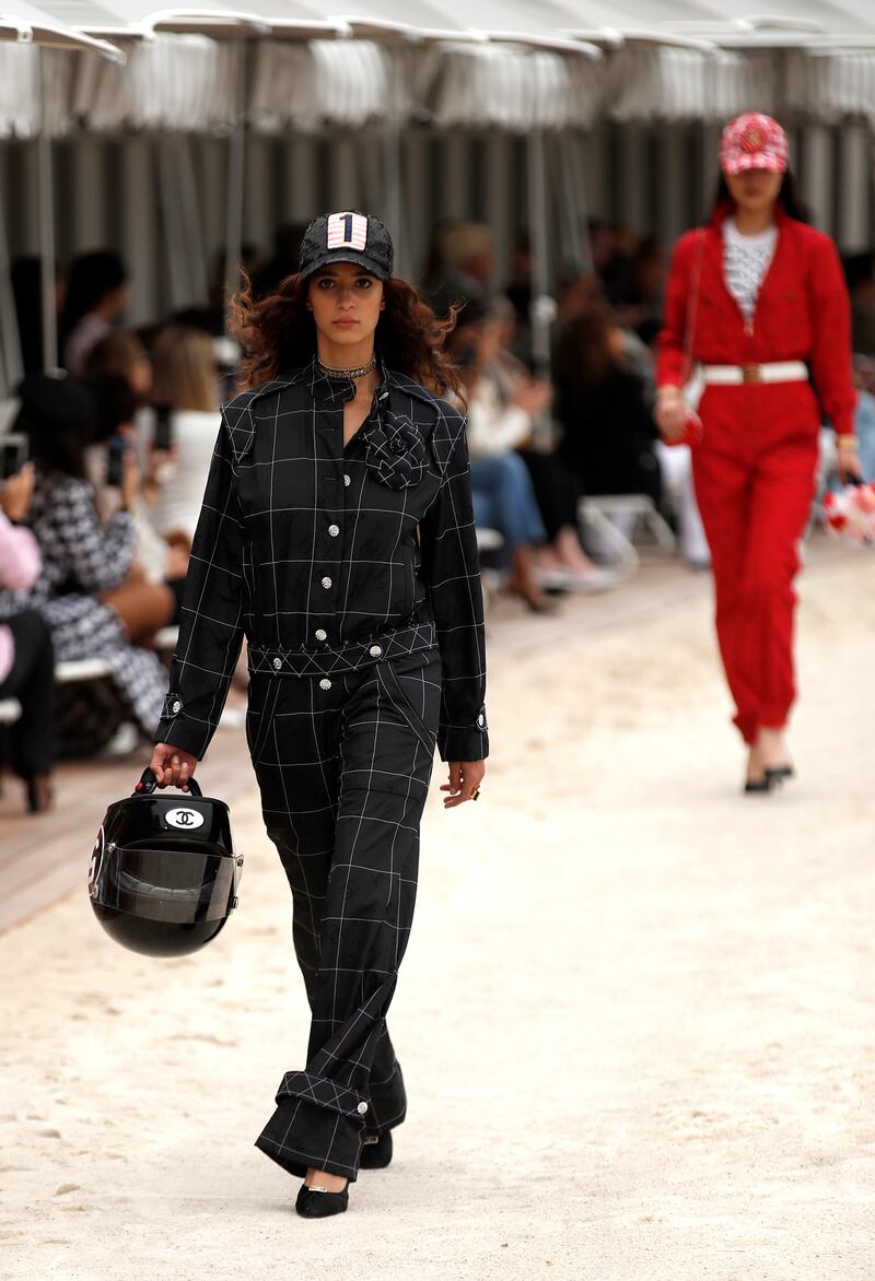 Like this look reminiscant of a race pit jumpsuit, the Chanel cruise 2022/23 collection was inspired by Monte Carlo's famous Grand Prix. Photo: EPA 