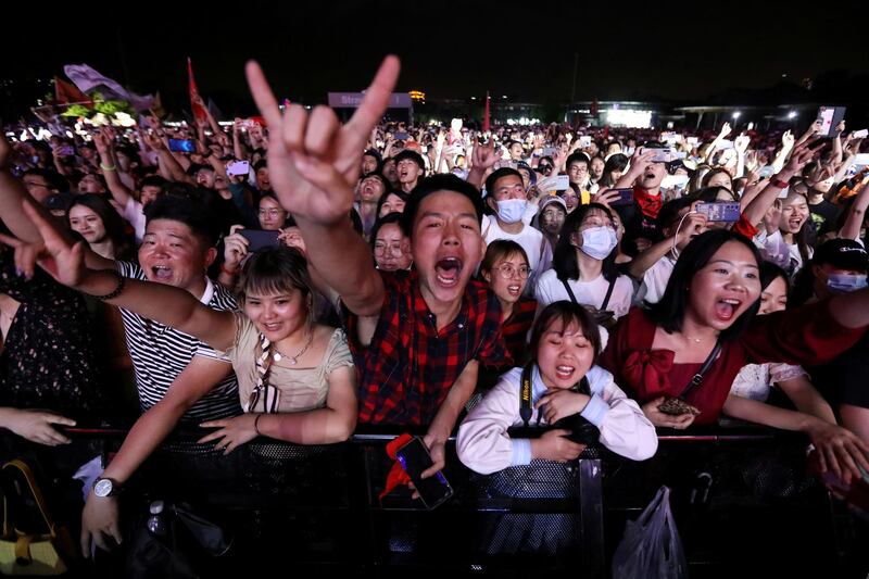 Fans attend a performance of a rock band at the Strawberry Music Festival, during the Labour Day holiday in Wuhan, Hubei province, China. Reuters
