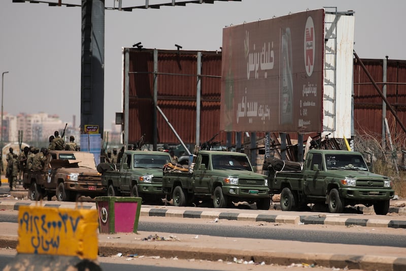 Sudanese security forces are deployed during a protest. AP