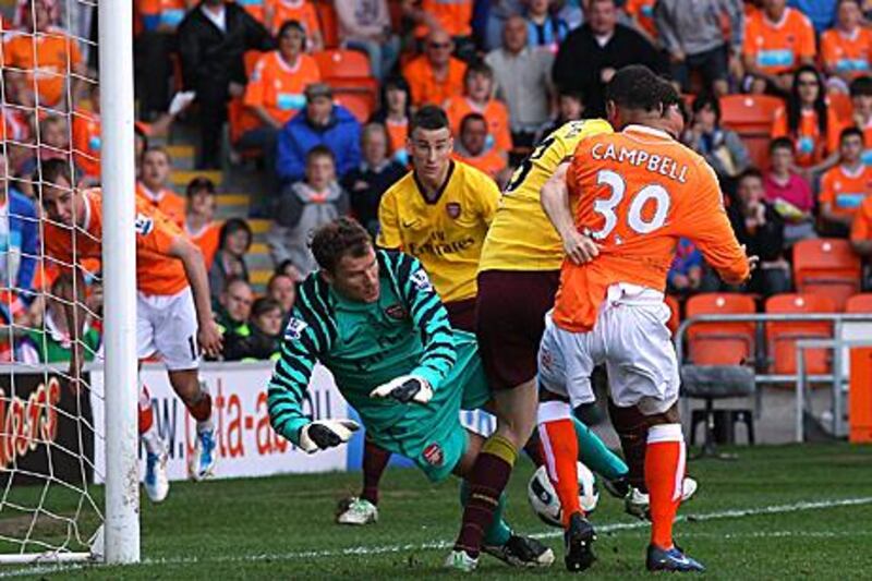 Jens Lehmann didn't have a quiet return in goal for Arsenal, but the Gunners win 3-1 at Blackpool.
