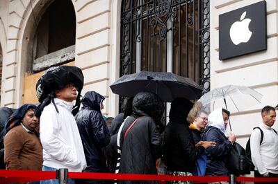 People queue outside the Apple Store near Place de l'Opera on the day Apple launches its iPhone 15. Apple is one of the 'Magnificent Seven' stocks that have been providing a good portion of the strength on US markets. REUTERS / Abdul Saboor