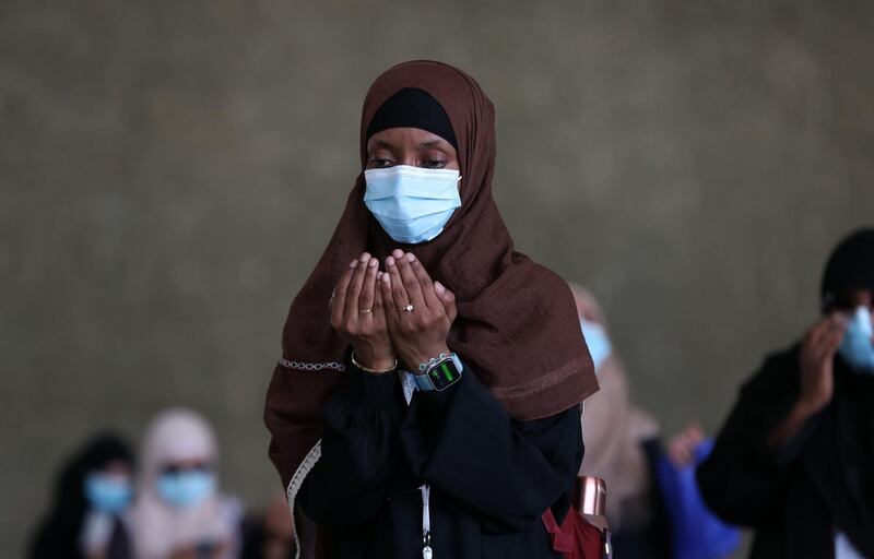 A pilgrim prays after throwing pebbles as part of the symbolic stoning of the devil during the Hajj pilgrimage in Mina, near Saudi Arabia's holy city of Makkah. AFP