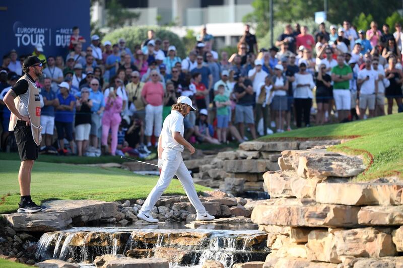 Tommy Fleetwood heads to the the green on the 18th. Getty