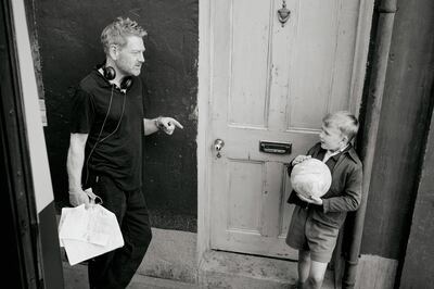 Director Kenneth Branagh, left, with young actor Jude Hill on the set of 'Belfast'. AP