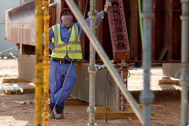 A worker at construction site in Riyadh. A new Labour Relation Initiative strengthening rights for workers in Saudi Arabia will come into force from March next year. Reuters