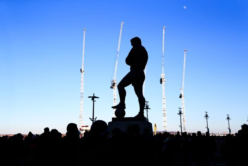 LONDON, ENGLAND - FEBRUARY 25: A silhouette of the Bobby Moore statue can be seen in amongst  the construction cranes before the Carabao Cup Final between Arsenal and Manchester City at Wembley Stadium on February 25, 2018 in London, England. (Photo by Catherine Ivill/Getty Images)