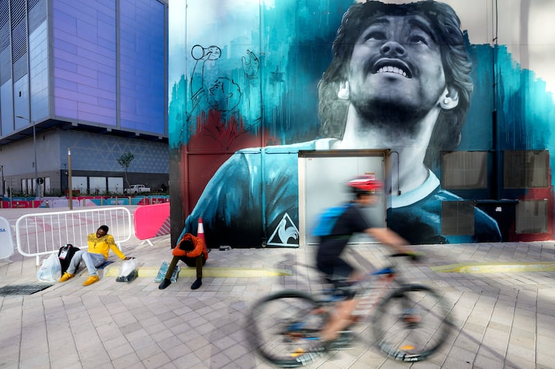 A mural of Diego Maradona at West Bay in Doha, on the second anniversary of the Argentina football legend's death on November 25, 2020. AP