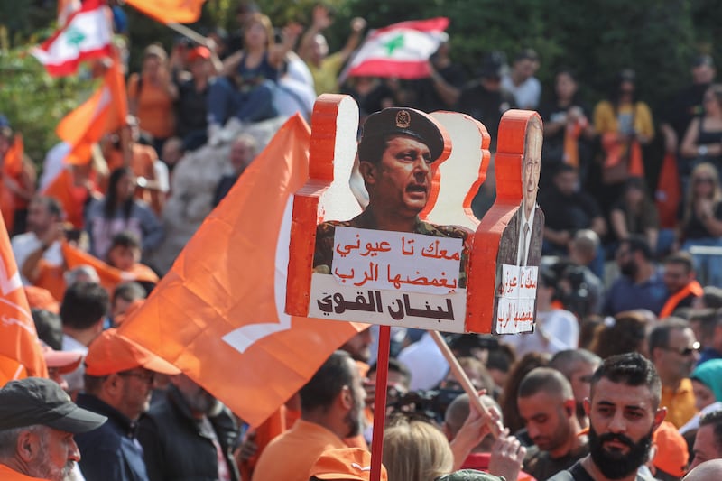 Supporters celebrate the career of Michel Aoun, Lebanon's departing president, at the presidential palace in Baabda, Lebanon. Reuters