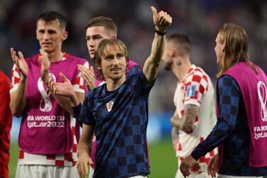 Croatia's midfielder #10 Luka Modric gives a thumb up after their victory in the Qatar 2022 World Cup round of 16 football match between Japan and Croatia at the Al-Janoub Stadium in Al-Wakrah, south of Doha on December 5, 2022.  (Photo by Adrian DENNIS  /  AFP)