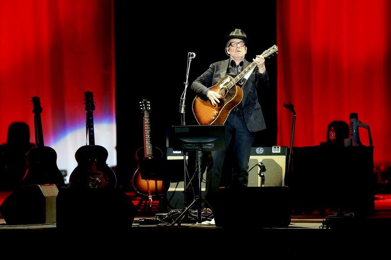 The singer and songwriter Elvis Costello performs solo, surrounded by four guitars, on day two of the Blended festival at Dubai Media City Amphitheatre in Dubai. Sarah Dea / The National / May 2/ 2014. 