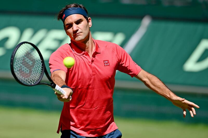 Roger Federer warms up prior to his match against Ilya Ivashka in the Halle Open first round. Getty Images