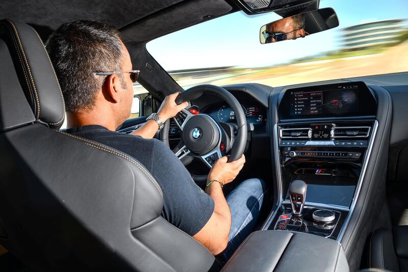 Gautam Sharma drives the BMW M8 Competition Coupe at the Autodromo Internacional do Algarve
