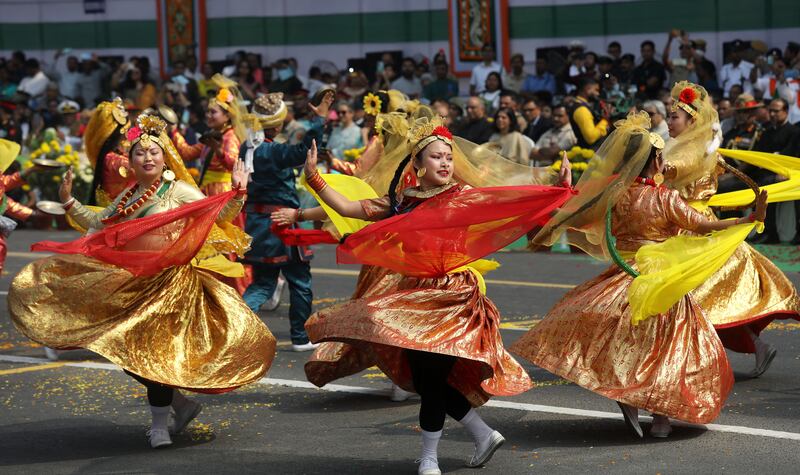 Indian students perform during a parade at the Red Road in Kolkata. EPA