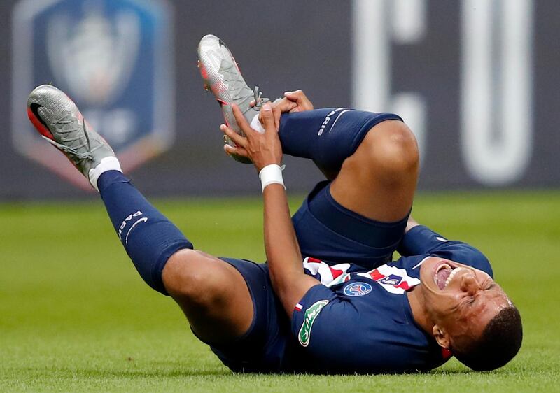 PSG's Kylian Mbappe in pain. AP