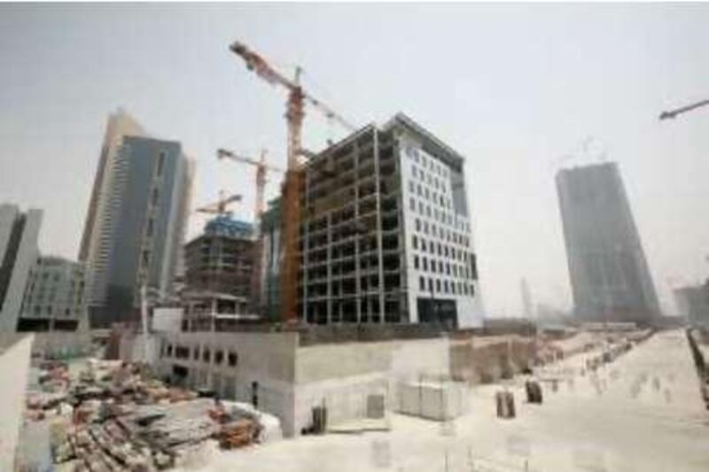 Dubai - July 8, 2008.  Construction near the Dubai International Financial Centre. ( Philip Cheung / The National ) *** Local Caption ***  PC0018-dubai2.jpgPC0018-dubai2.jpg