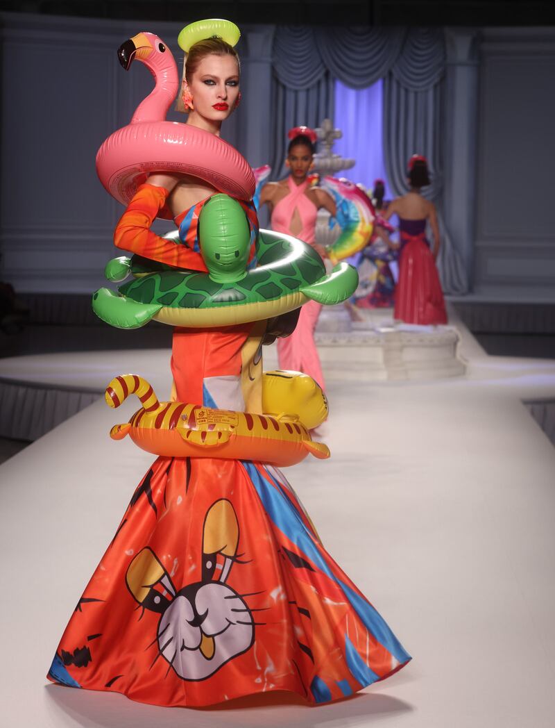 A dress made from an inflatable paddling pool and rubber rings at the Moschino show. EPA 