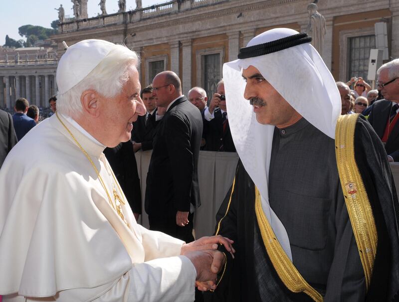 Pope Benedict XVI (L) shakes hands with President of the United Arab Emirates' parliament S.E Abdul Aziz Al Ghuraih after his weekly audience on October 22, 2008 at St Peter's square at the Vatican.  AFP PHOTO / OSSERVATORE ROMANO / POOL RESTRICTED TO EDITORIAL USE (Photo by OSSERVATORE ROMANO / AFP)