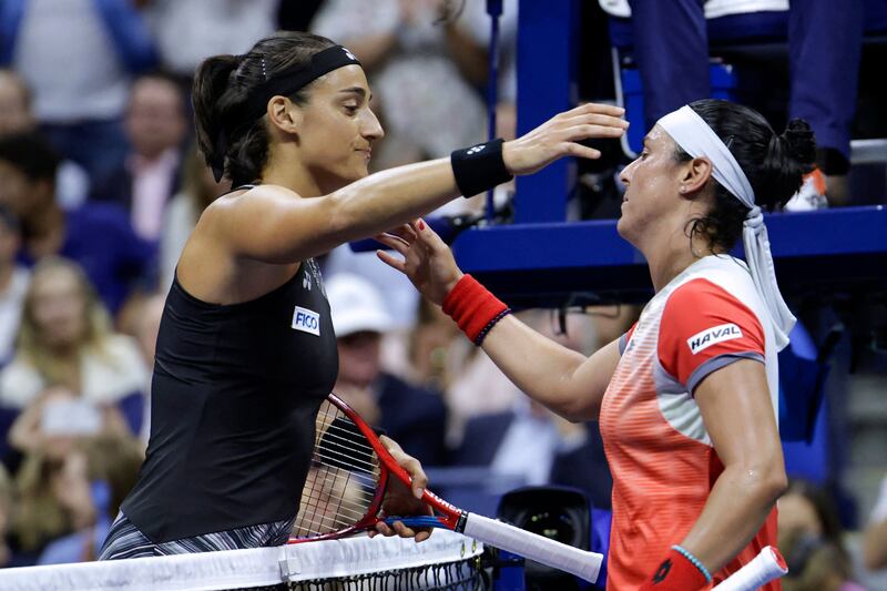 Ons Jabeur and Caroline Garcia after the semi-final. AFP