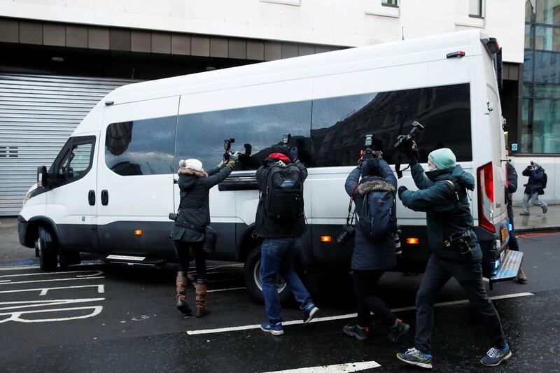 A prison van arrives at the Westminster Magistrates Court. Reuters