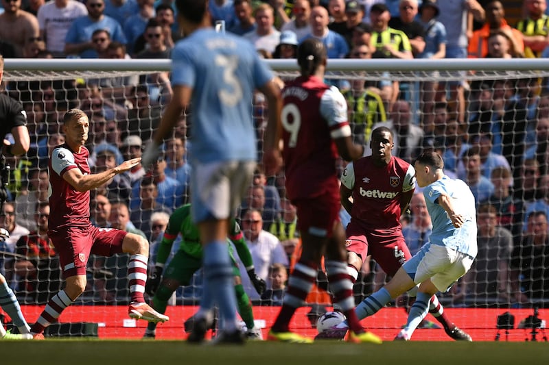 Manchester City's Phil Foden scores the opening goal. AFP